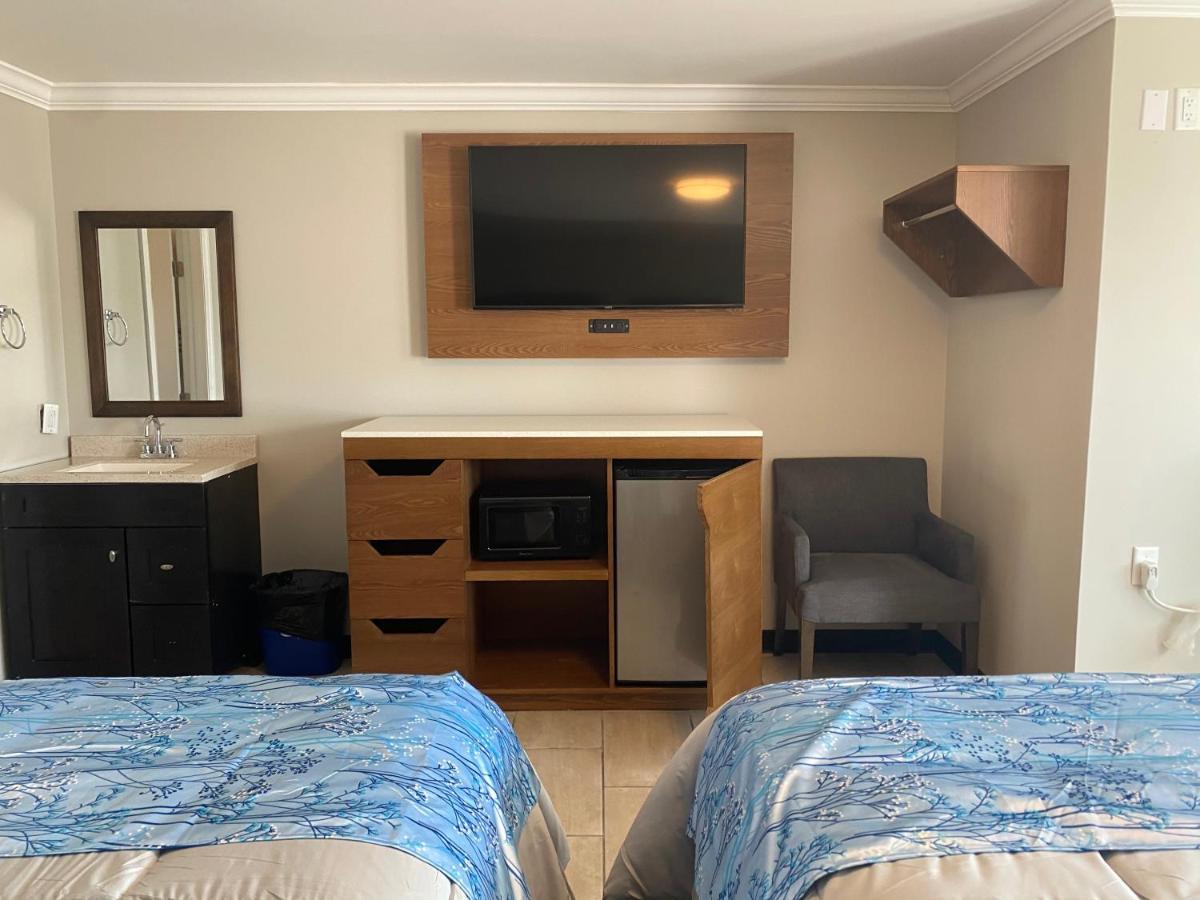 Coastal Sands Inn Уайлдууд Екстериор снимка