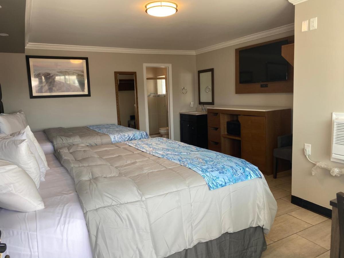 Coastal Sands Inn Уайлдууд Екстериор снимка