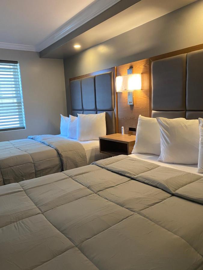 Coastal Sands Inn Уайлдууд Екстериор снимка