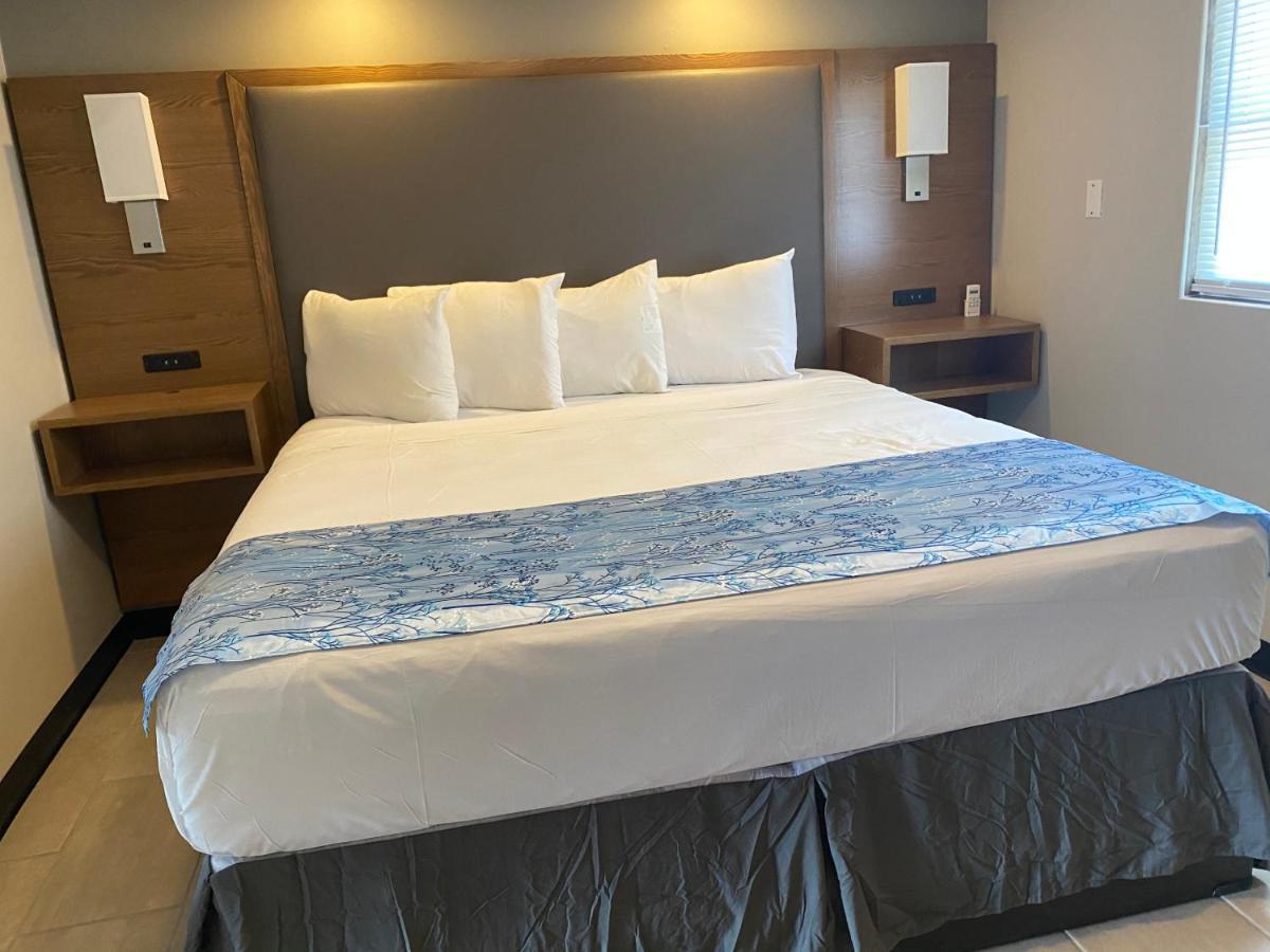 Coastal Sands Inn Уайлдууд Екстериор снимка