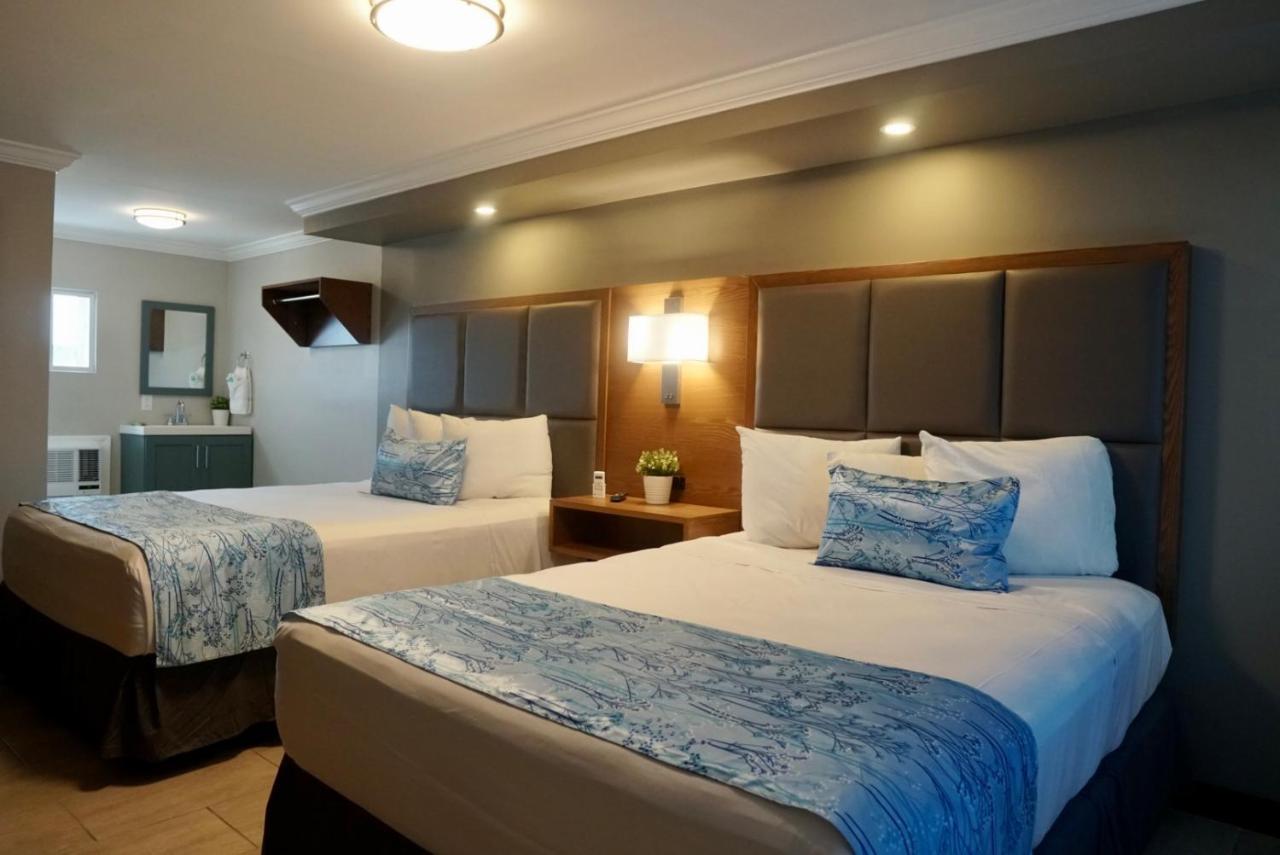 Coastal Sands Inn Уайлдууд Екстериор снимка